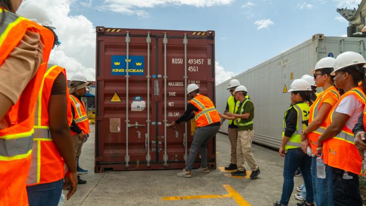Officials opening a container in Dominican Republic